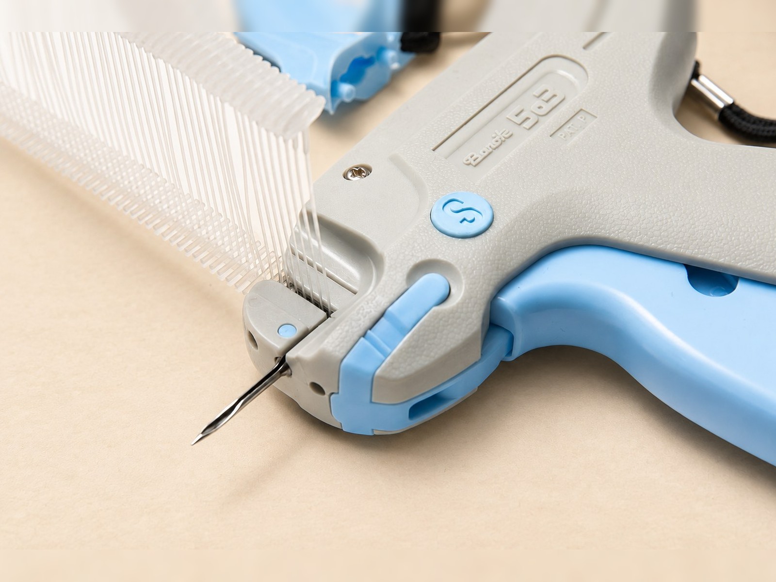 Tagging Gun needle and Tag Pins, close-up