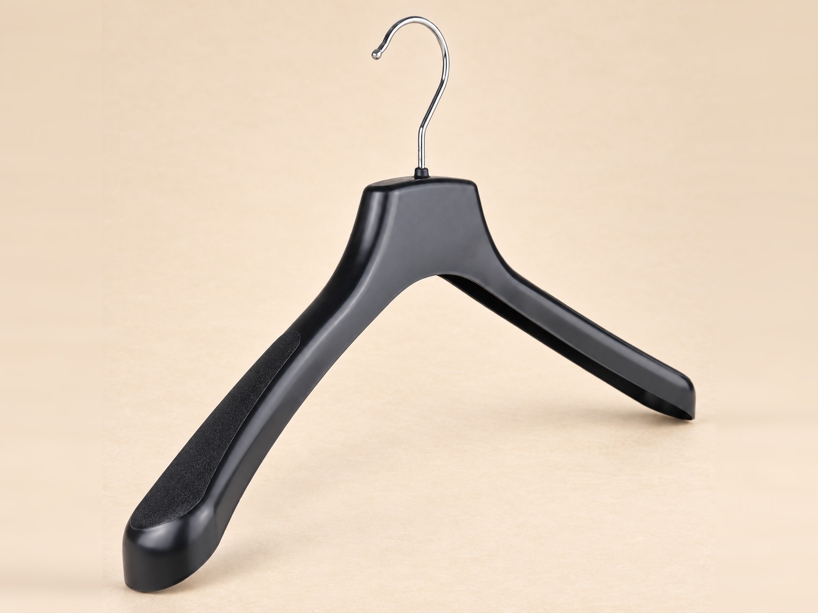 Black plastic Hanger with flocked shoulder
