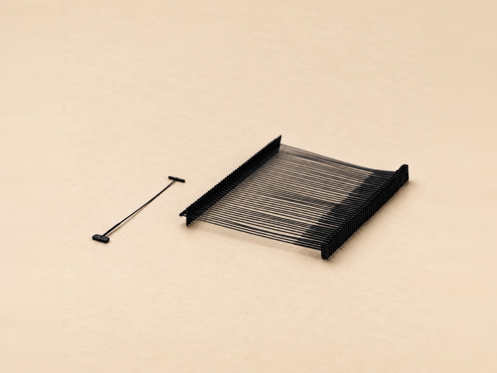 Black Tag Pins — clip strip and single pin